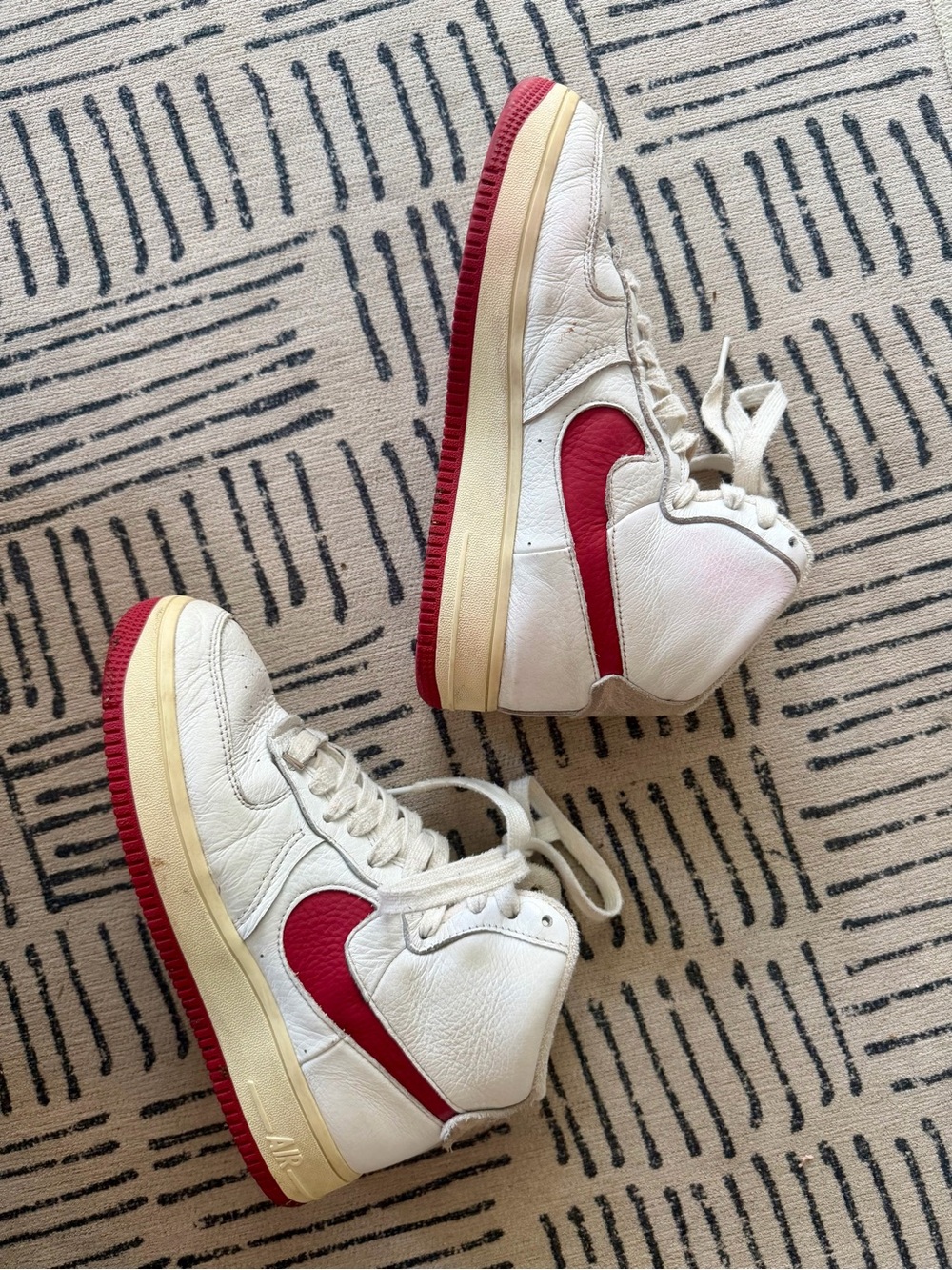 Nike Air Force 1 High '07 white sneakers with red Nike swoosh